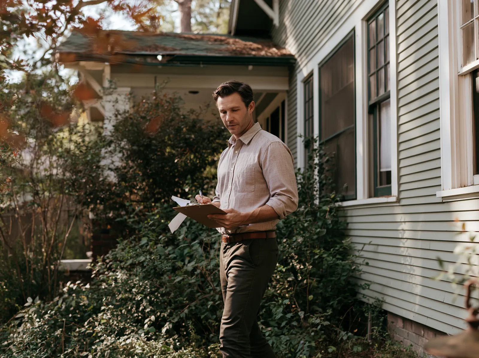 Tired landlord property buyers evaluating a Seattle rental house